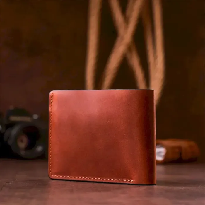 Стильне портмоне унісекс GRANDE PELLE 11236 Коричневе