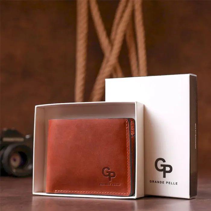 Стильне портмоне унісекс GRANDE PELLE 11236 Коричневе