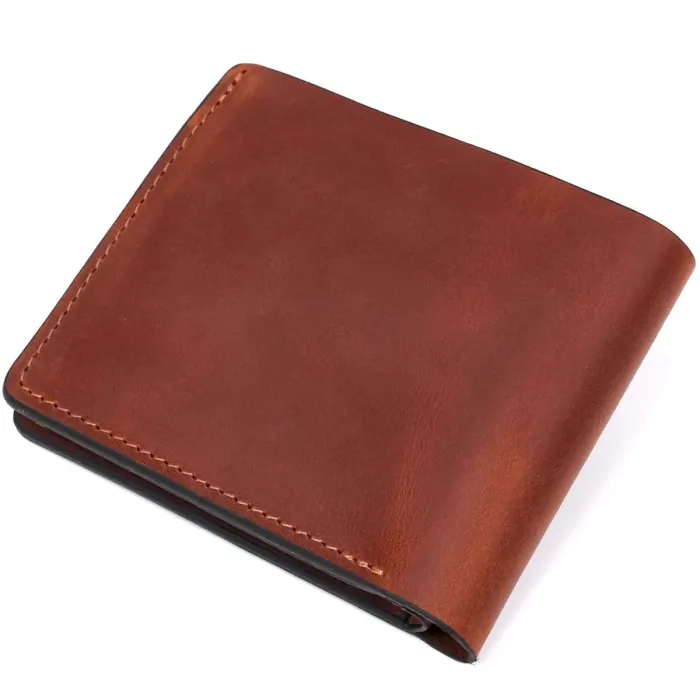 Стильне портмоне унісекс GRANDE PELLE 11236 Коричневе