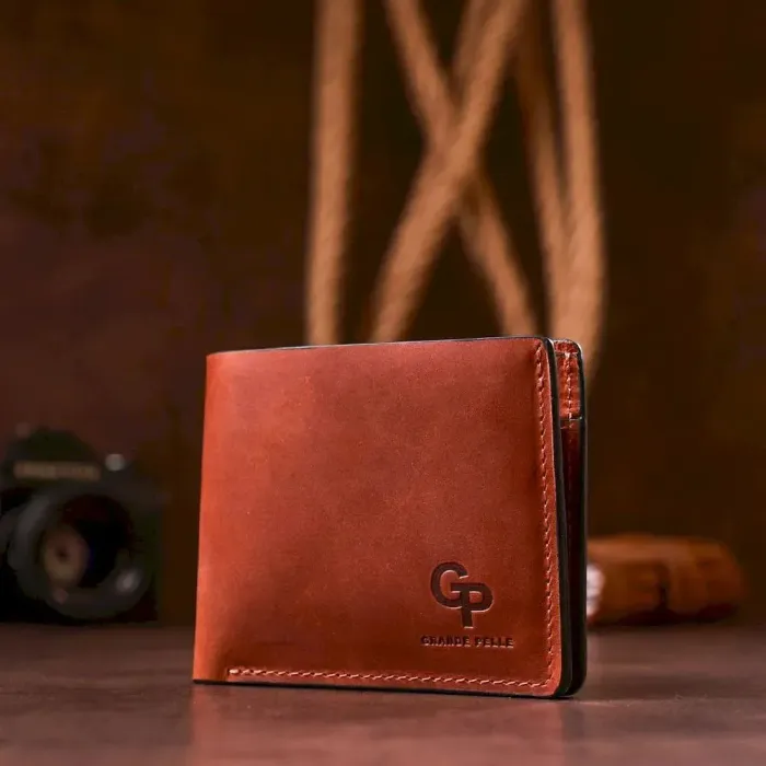 Стильне портмоне унісекс GRANDE PELLE 11236 Коричневе