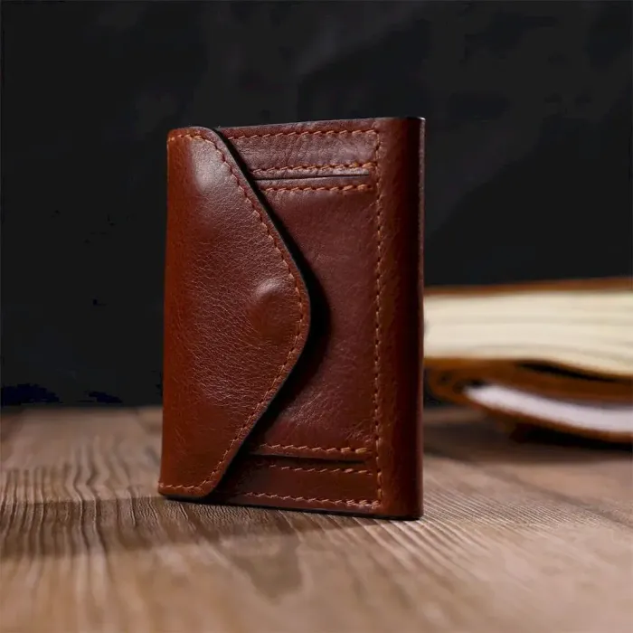 Стильний чоловічий гаманець у три складання GRANDE PELLE 16786 Коричневий