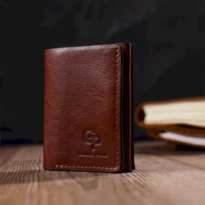 Стильний чоловічий гаманець у три складання GRANDE PELLE 16786 Коричневий