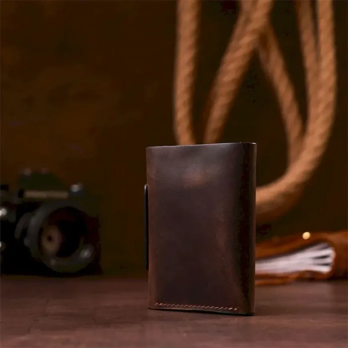 Строгое портмоне унисекс в винтажном стиле GRANDE PELLE 11151 Коричневое