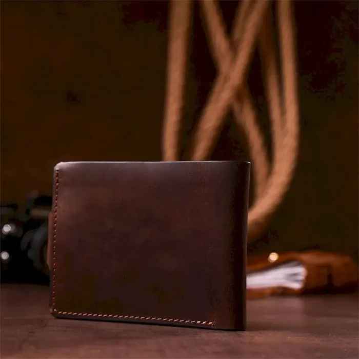 Тонке шкіряне портмоне унісекс GRANDE PELLE 11220 Коричневе