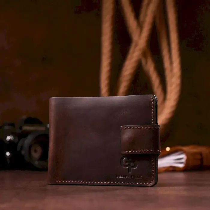 Тонке шкіряне портмоне унісекс GRANDE PELLE 11220 Коричневе
