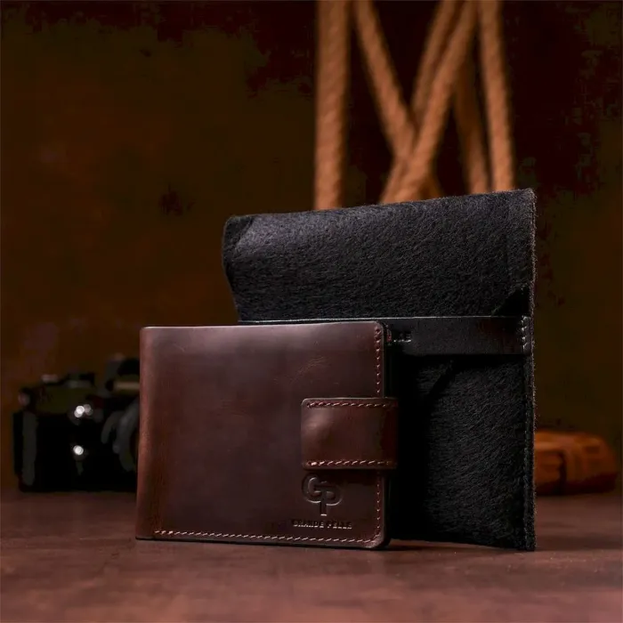 Тонке шкіряне портмоне унісекс GRANDE PELLE 11220 Коричневе