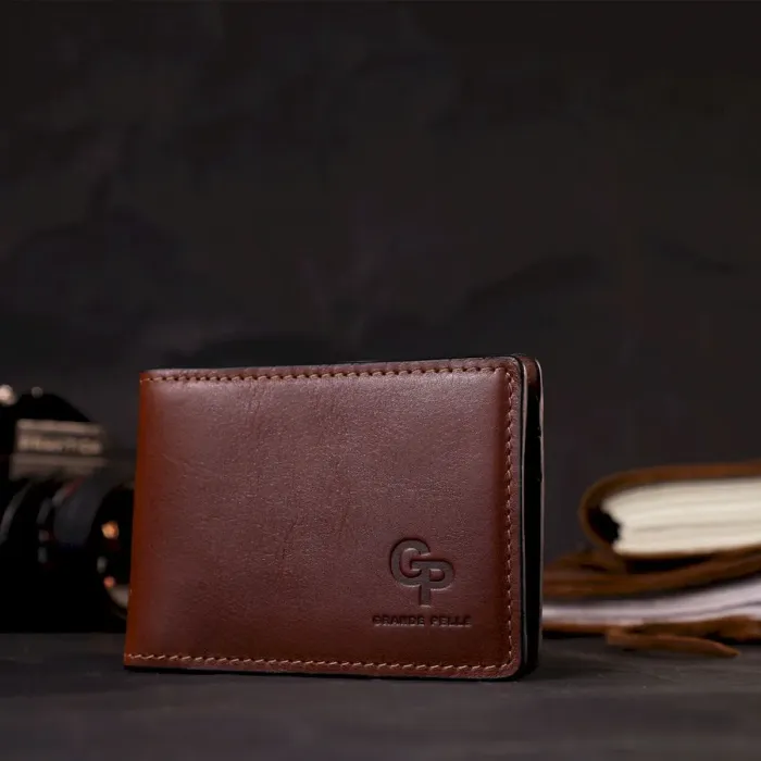 Зручний шкіряний затискач для грошей GRANDE PELLE 11636 Коричневий