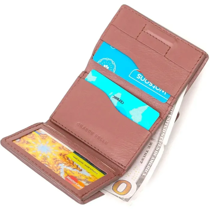 Вертикальне невелике жіноче портмоне в три додавання GRANDE PELLE 16784 Пудровий