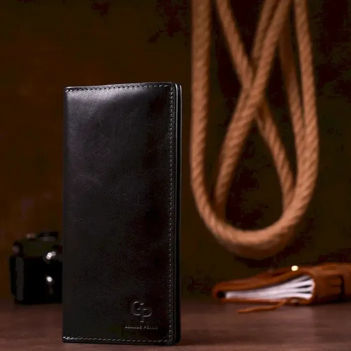 Вертикальный бумажник унисекс на магните GRANDE PELLE 11212 Черный