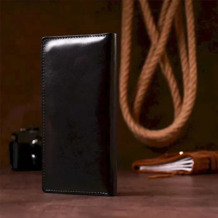 Вертикальный бумажник унисекс на магните GRANDE PELLE 11212 Черный