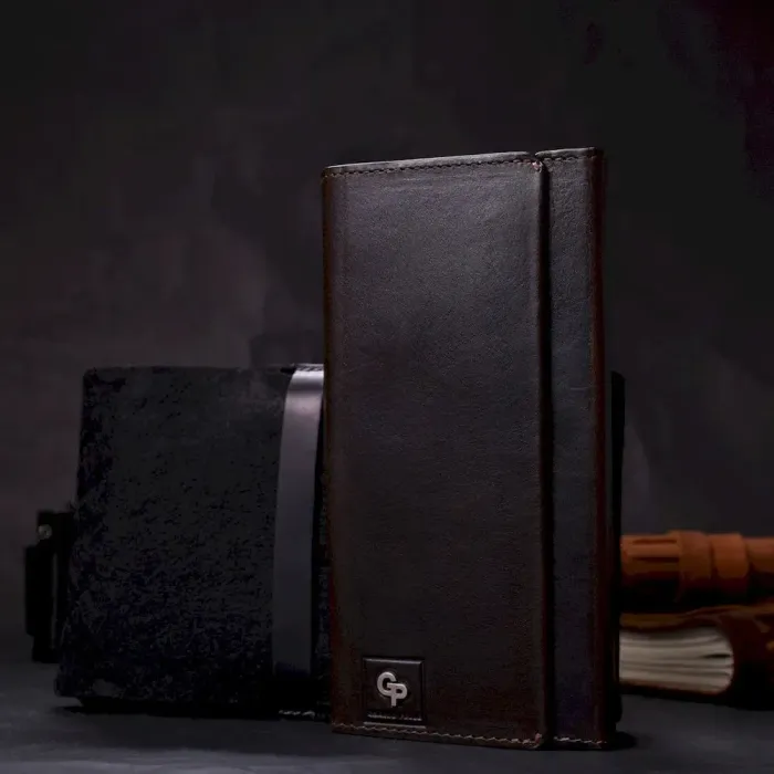 Вертикальний гаманець із відділенням для телефону з натуральної шкіри GRANDE PELLE 11645 Коричневий