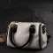 Жіноча сумка барильце з темними акцентами Vintage 22352 Біла