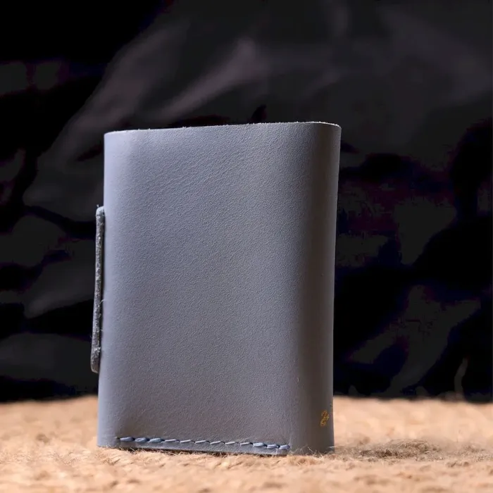 Жіноче шкіряне портмоне в три додавання комбі двох кольорів Серце GRANDE PELLE 16731 Жовто-блакитне