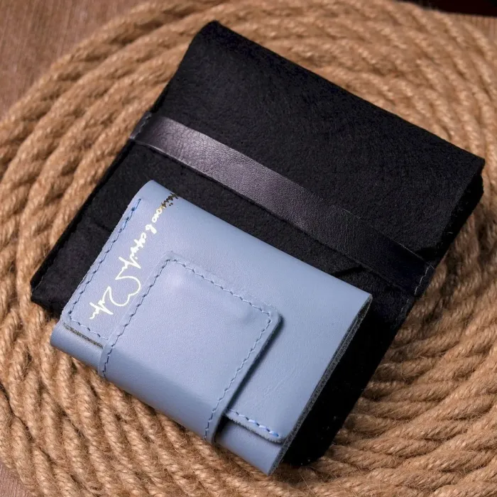 Жіноче шкіряне портмоне в три додавання комбі двох кольорів Серце GRANDE PELLE 16731 Жовто-блакитне