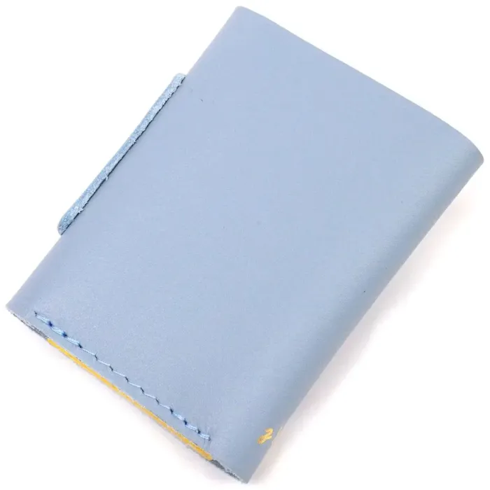 Жіноче шкіряне портмоне в три додавання комбі двох кольорів Серце GRANDE PELLE 16731 Жовто-блакитне